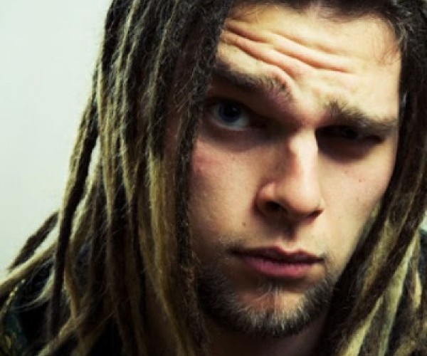 Young man with dreadlocks